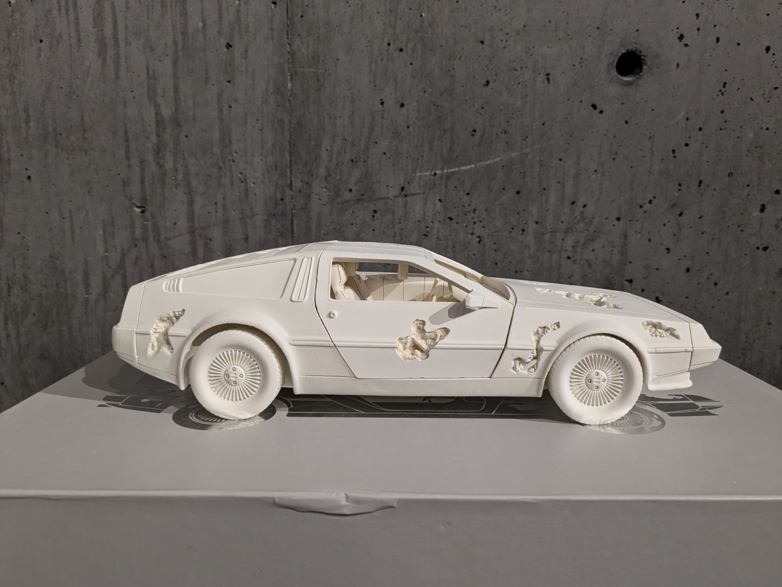Eroded DeLorean (White), a sculpture by Daniel Arsham